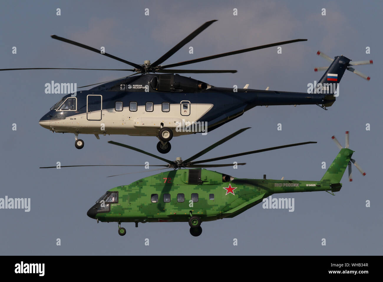 Two Mil Mi-38 helicopters - VIP and Transport version - perform the flight display on the final day of MAKS-2019 Moscow International Airshow near Zhukovsky, South-East of Moscow. Stock Photo