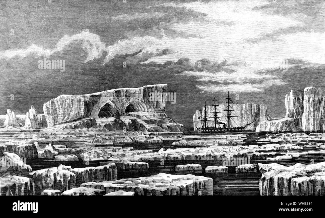 Ship among the icebergs of the Antarctic. HMS CHALLENGER, 1874. . The British survey ship HMS Challenger in Antarctic waters in February 1874. Contemporary wood engraving. Stock Photo