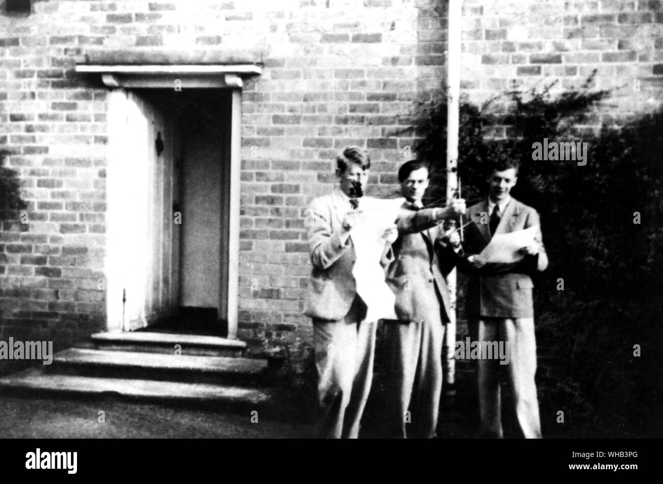 Hugh Wystan WH Auden, with Sir William Coldstream an English realist painter and teacher and Benjamin Britten at the Downs School Colwall 1935 . at Colwall 1935 Stock Photo