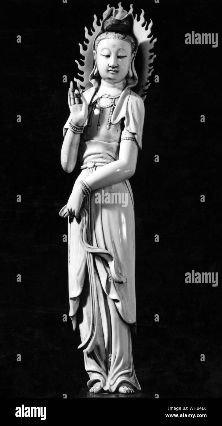 Kuan-yin - Chinese Queen of Heaven - The name Guanyin, also spelt Kuan Yin, is short for Kuan-shih Yin which means Observing the Sounds (or Cries) of the World.. Stock Photo
