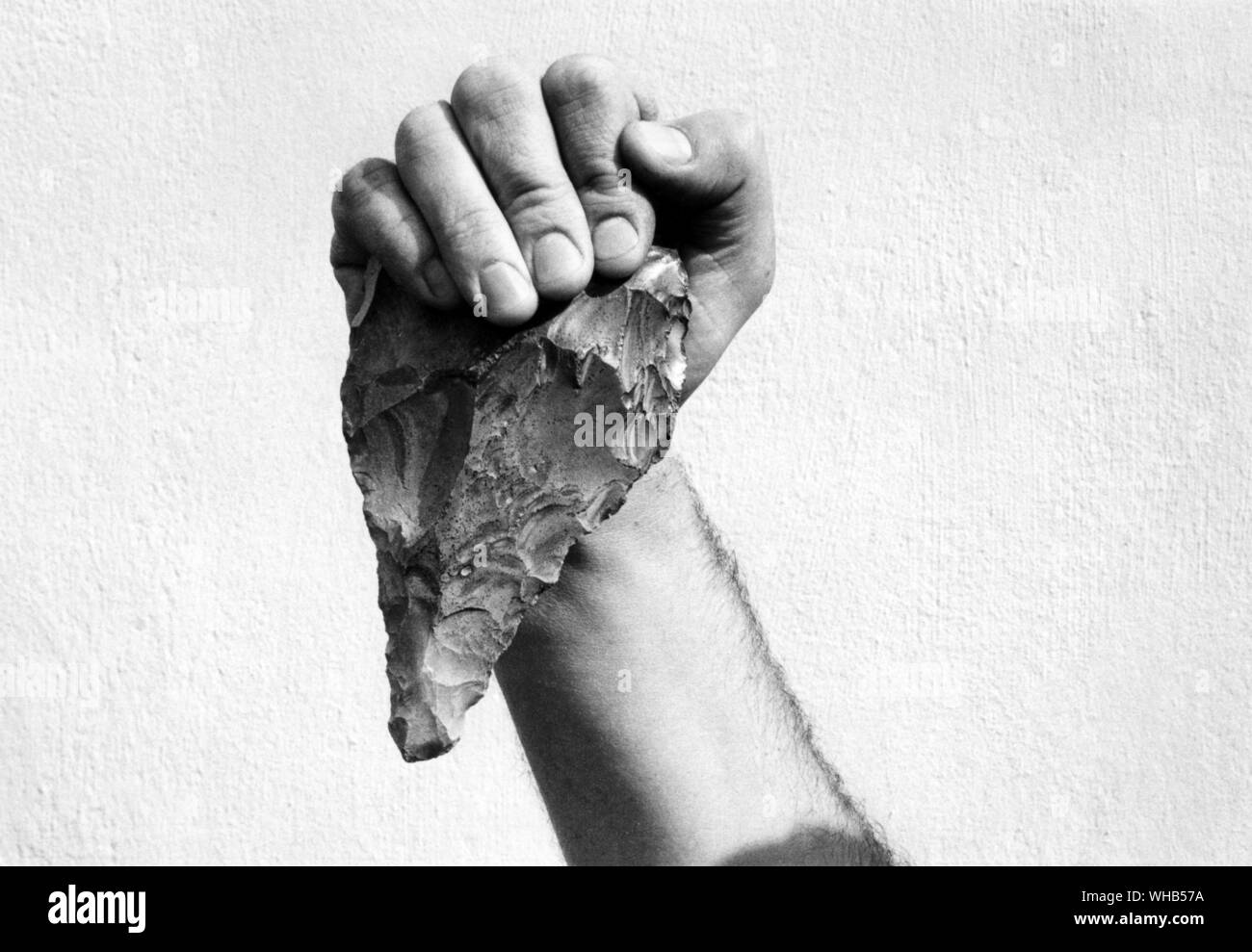 Acheulean flint hand axe Acheulean is the name given to an archaeological industry of stone