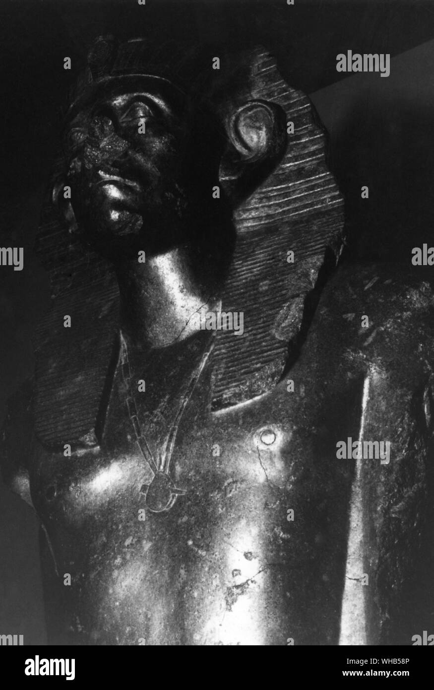 Black graphite statue of Khakhaure Senusret III (also written as Senwosret III or Sesostris III) - a pharaoh of Egypt. He ruled from 1878 BC to 1839 BC, and was the fifth monarch of the Twelfth Dynasty of the Middle Kingdom. He was a Great Pharaoh of the twelfth Dynasty and is supposed to be the most powerful Egyptian ruler of this time. For this, he is regarded as one of the sources for the legend about Sesostris.. Stock Photo