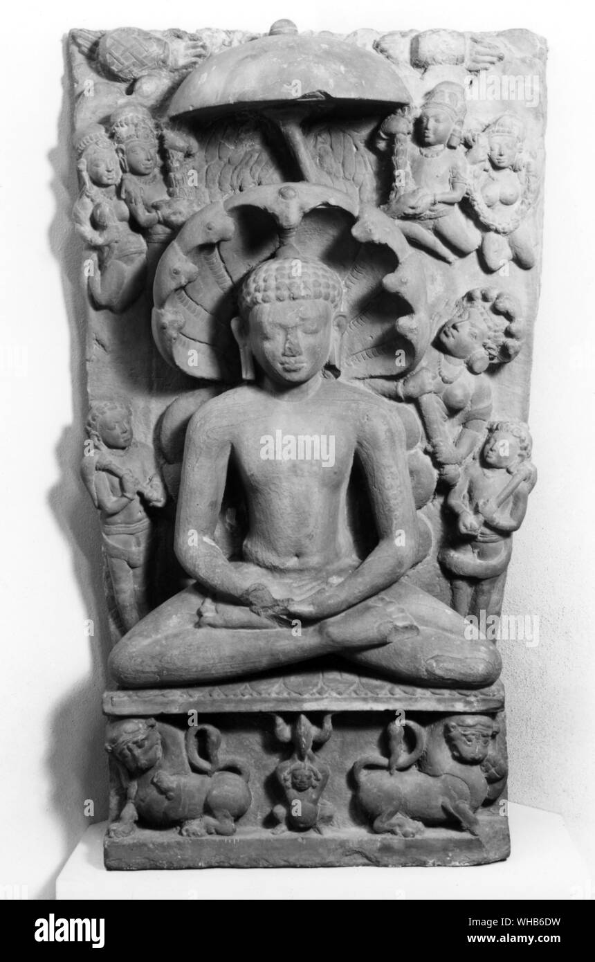 Parsvanatha Statue - Parshva or Parshvanatha Parshvanath or Parswanath) was the twenty-third Tirthankara (fordmaker) in Jainism. He probably lived from about 750 BCE to about 650 BCE. He is the earliest Jain leader whom modern scholars consider to be a historical figure. The Yaksha Dharanendra and the Yakshi Padmavati are often shown flanking him (benevolent spirits). The seven-hooded serpent Shesh umbrella-like unfurling its hoods over the deity, represented elements of the earth and the ocean.. Stock Photo