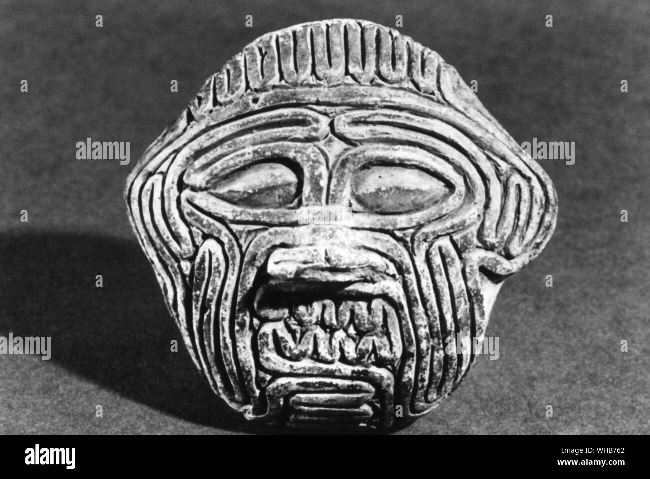 The demon Humbaba ( or Huwawa ) - god of intenstines - Humbaba semi-legendary king of Uruk ( or Erech ). - Humbaba guards the cedars of the sacred forest - . Gilgamesh killed Humbaba by cutting off his head - . Huwawa in the Old Babylonian and Hittite versions, Humbaba in the Assyrian version.. Stock Photo