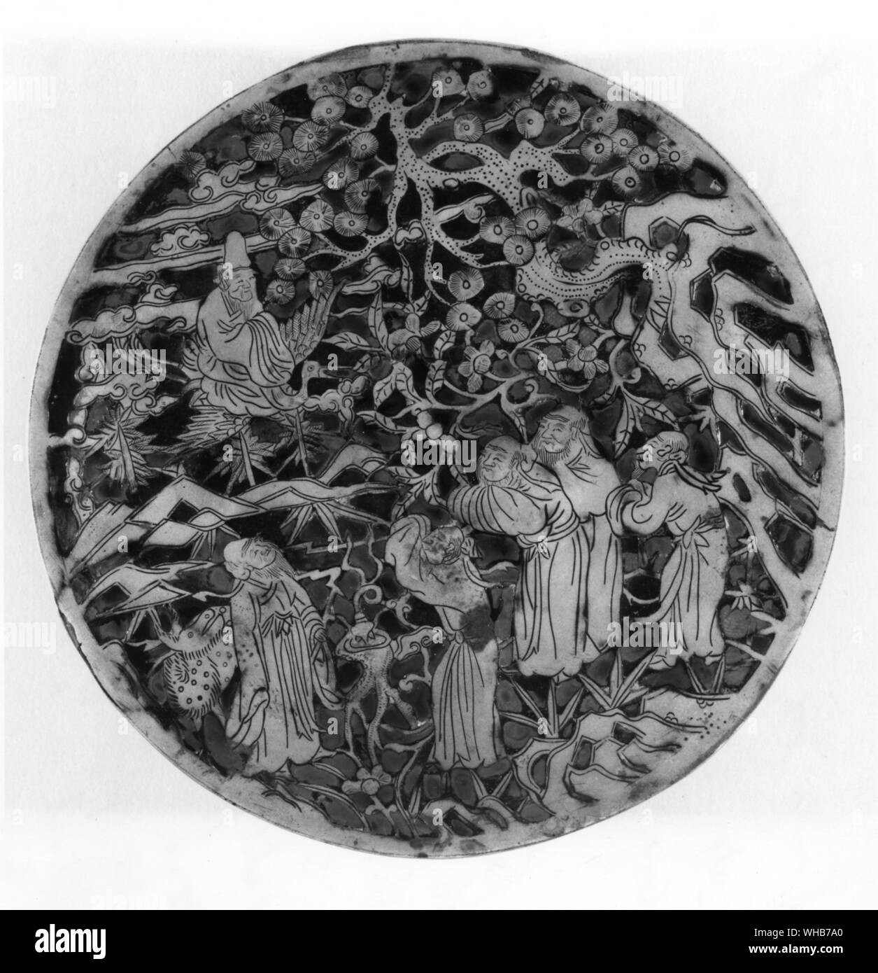 Spirits of the corn. Nature and Culture. The Taoists of China possessed an extensive lore about the sacred properties of plants Here Chinese immortals enjoy the gifts of nature and watch the arrival of Lao Tsin god of immorality on a crane. The pine the plum and the bamboo are symbols of longevity. Bronze and lacquer box 16 to 17th century Stock Photo