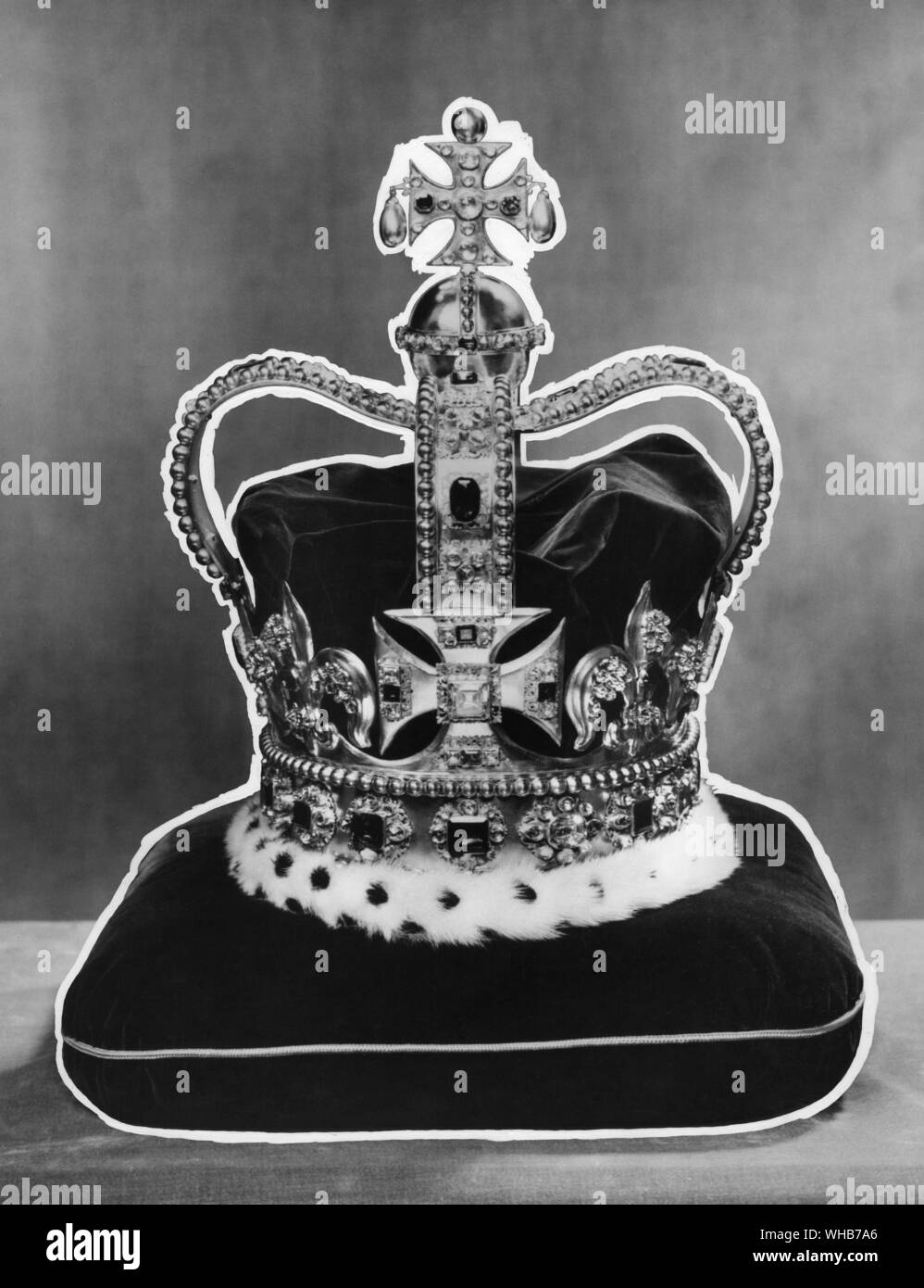 The Crown of England copied in the time of Charles II from the anicient crown worn by Edward the Confessor and used at the coronation of every monarch since. . coronation crown of the kings and queens of England that consists of a gold- and jewel-encrusted base surmounted by a cross. Stock Photo