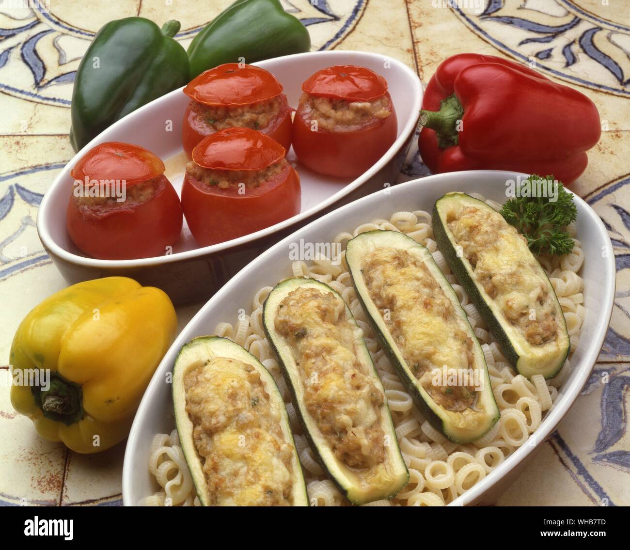 Stuffed courgettes and tomatoes. Stock Photo