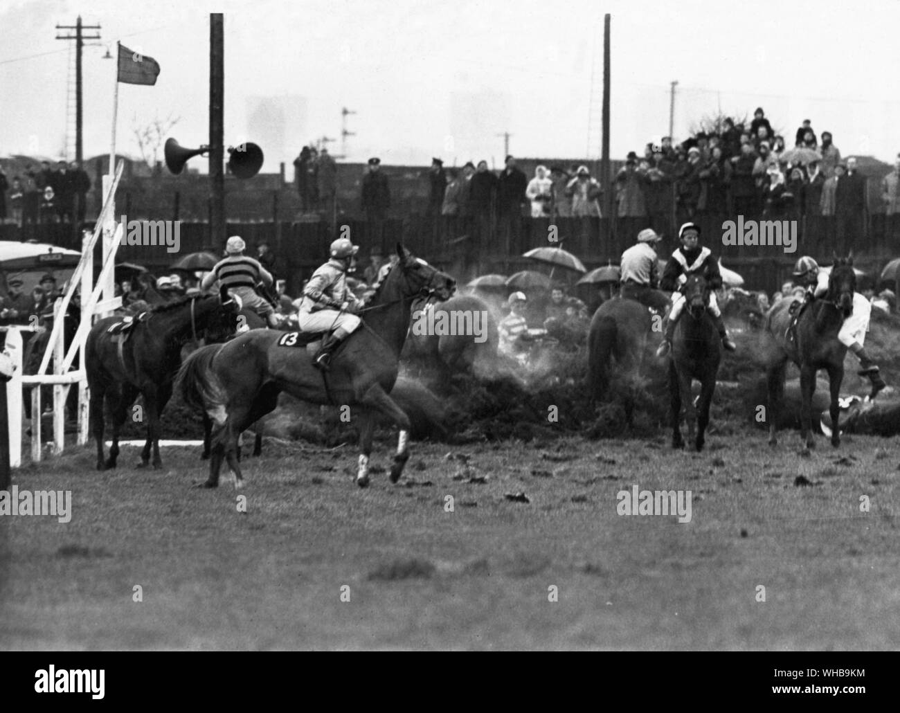 Grand National at Aintree 1967 , chaos of horses and jockeys at the 23rd fence caused by a loose horse crossing the length of the jump. . 8 April 1967 Stock Photo
