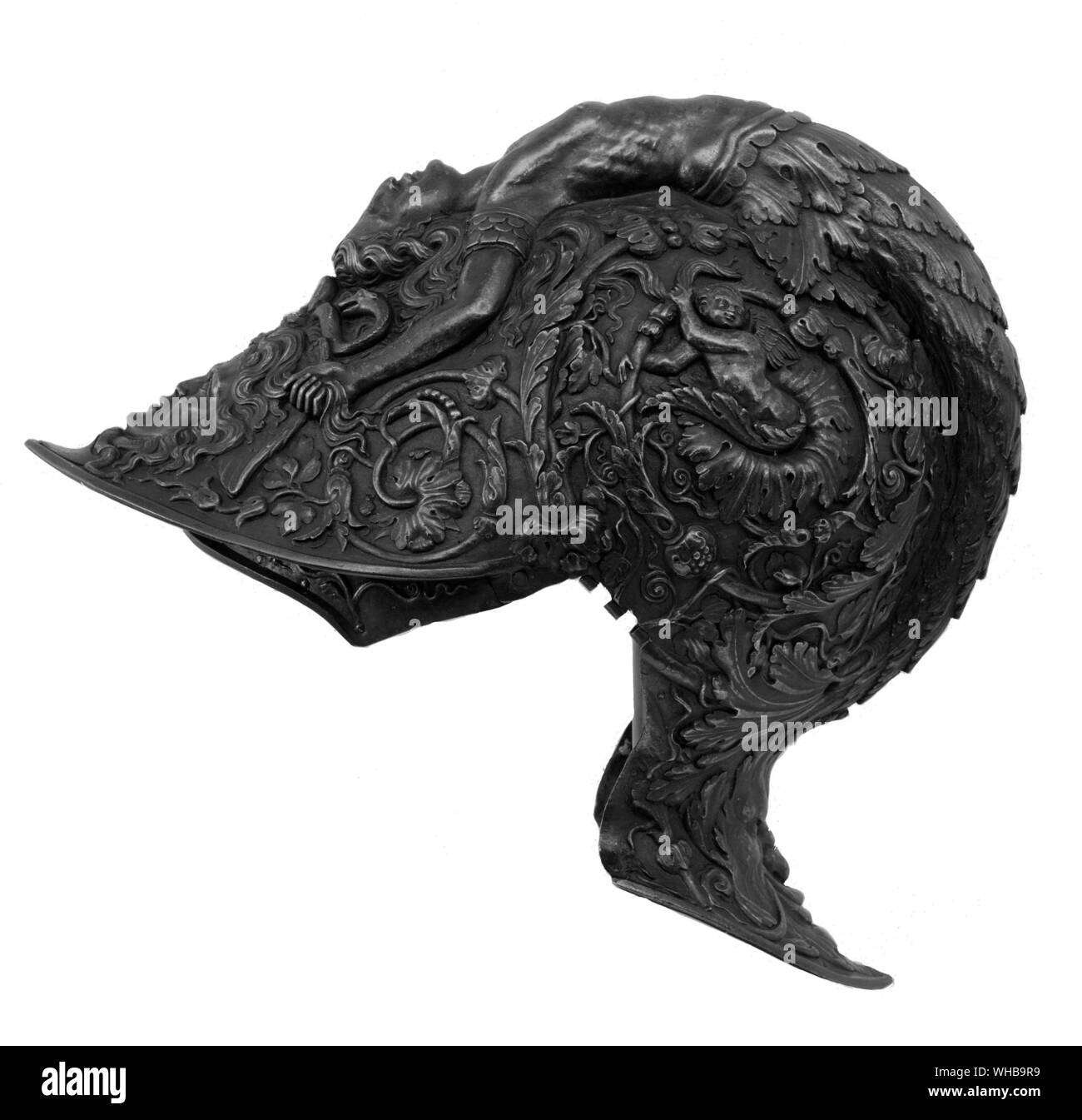 Italian armour. A Parade helmet of embossed and chiselled steel , probably commissioned by Francois I . It was made in 1543 by Filippo (Philip) Negroli of Milan in embossed and chiselled steel Stock Photo