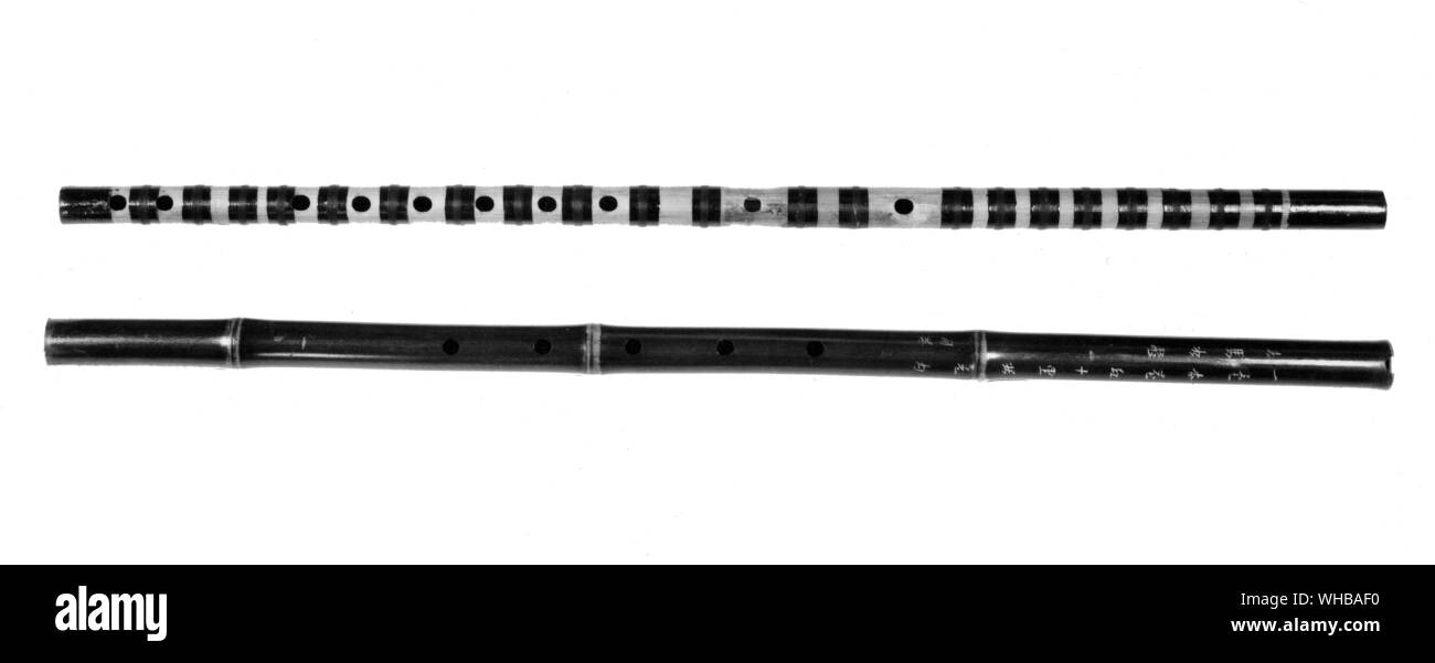 Traditional Chinese Woodwind Instruments top : Ti-tsu 24 inches or 60.9 cm bottom : Hsiao 24 inches oe 60.9 cm. E O Pogson Collection Stock Photo