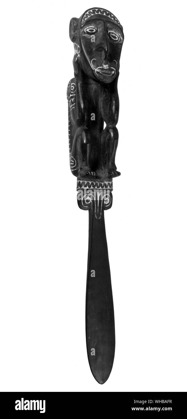 Handle of a lime spatula , Massim area , south east Papua . Overall length 10 1/2 inches or 26.6 cm. The British Museum , London Stock Photo
