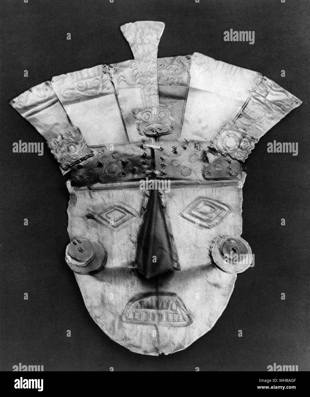 Funeral mask , Nazca culture , Peru , South America .7th or 8th Century . Height 12 5/8 inches or 32 cm . The Mujica Gallo Collection , Lima Stock Photo