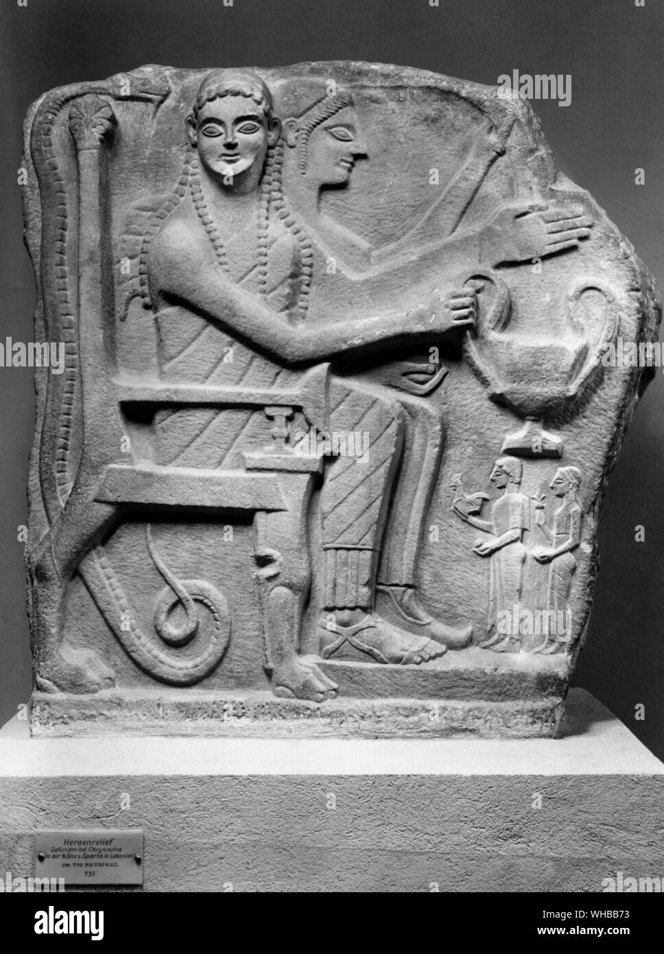 The Chrysapha Relief - takes the form of a typical Laconian hero relief . Seated hero couple being approached by worshippers 550 - 540 BC Stock Photo