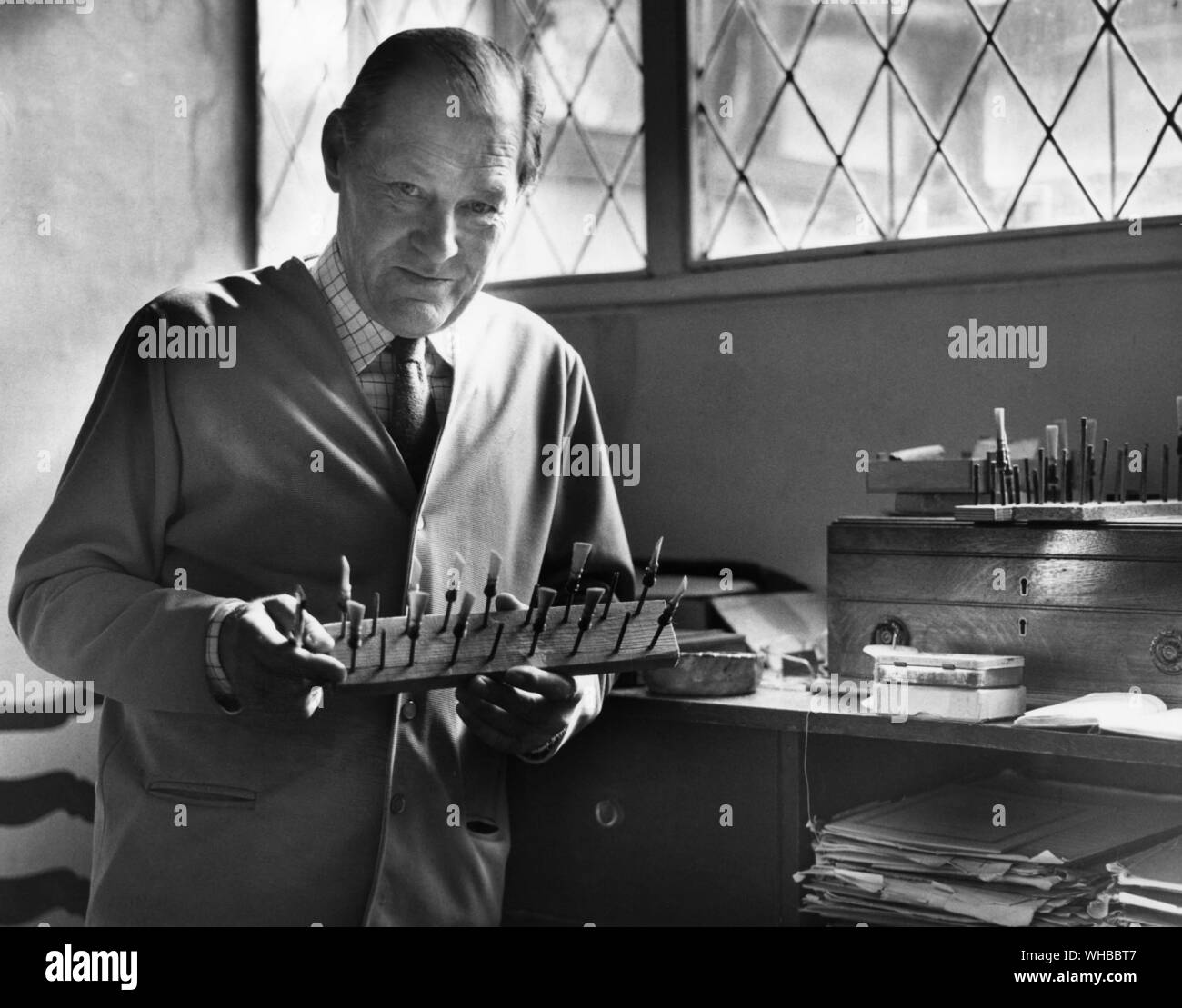 Cecil James with his bassoon reeds - French system. Stock Photo