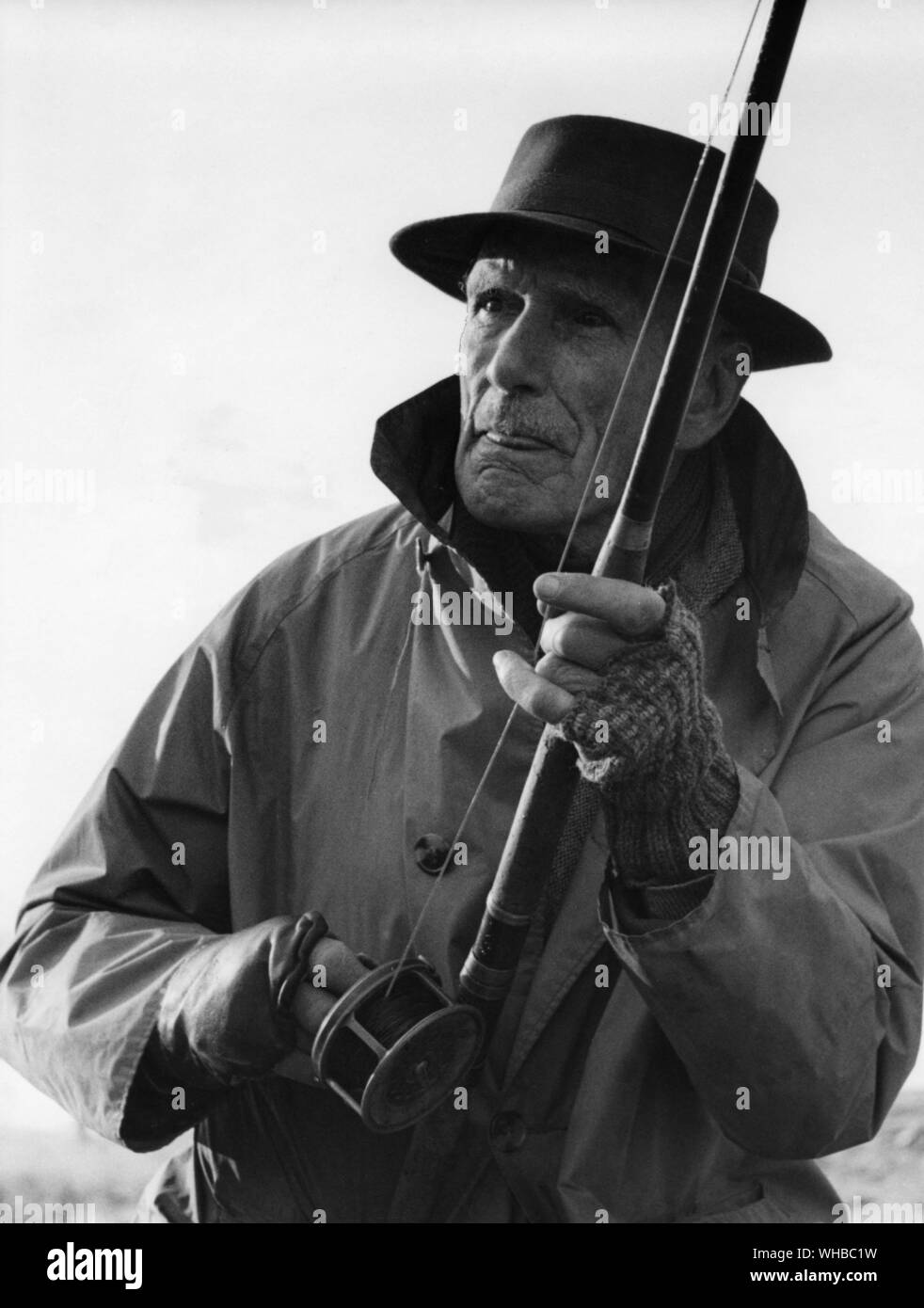 Tense moment on Teviot with a salmon fish on the end of the fishing line Stock Photo