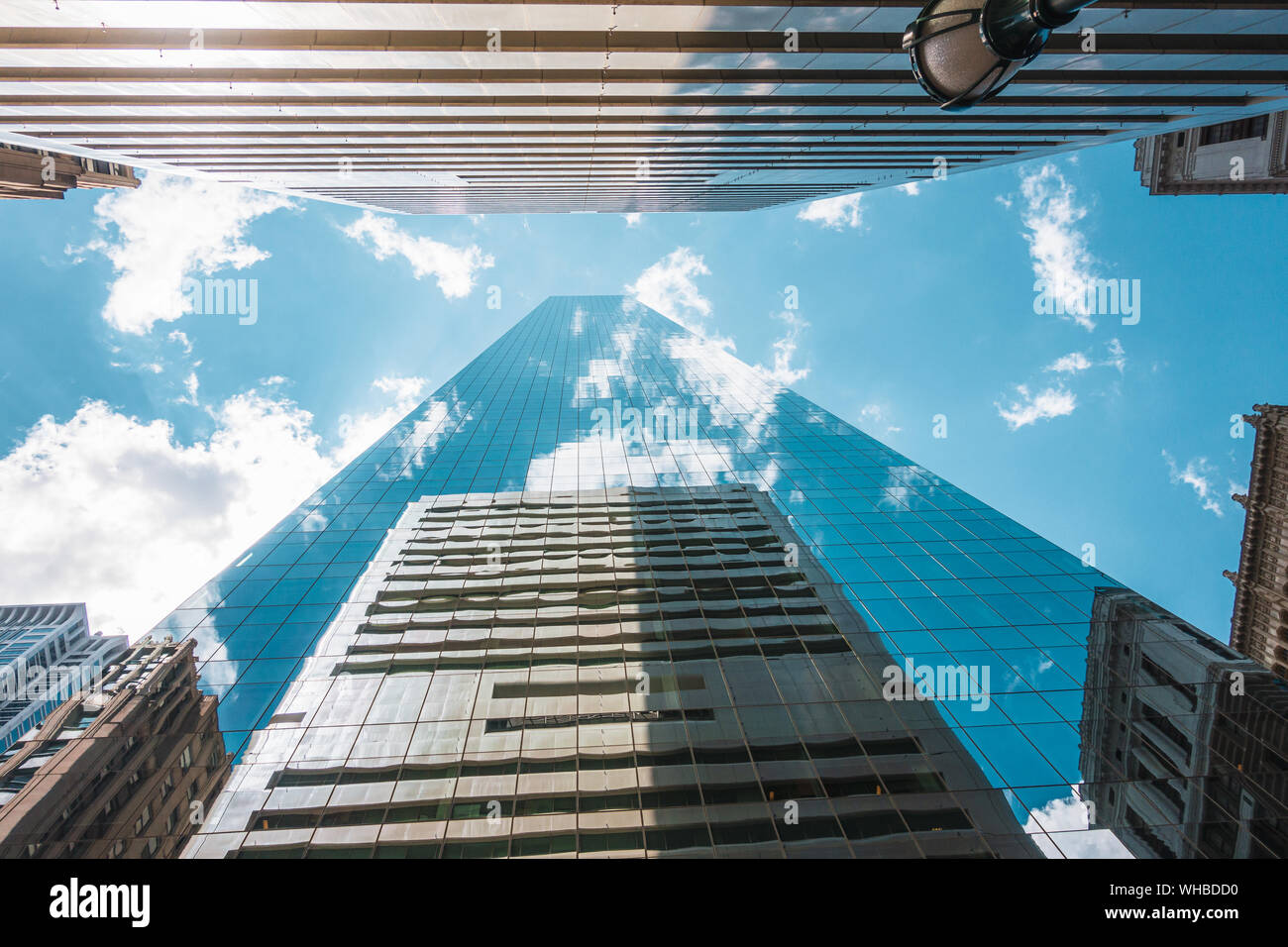 Skyscrapers, point of view from under to top, with reflections of clouds in the windows, center of city of  Philadelphia, USA Stock Photo