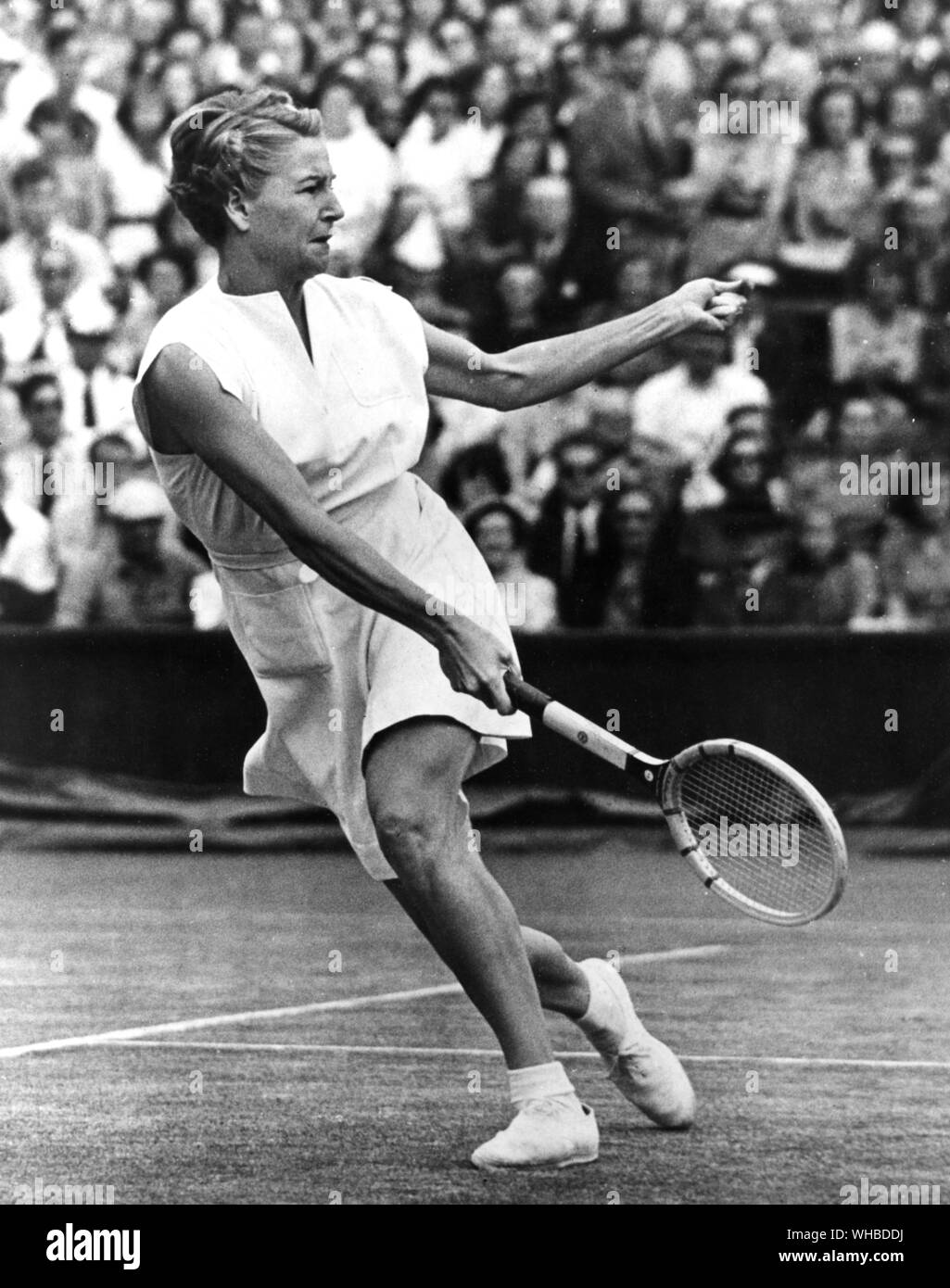 Wimbledon - Mrs. Louise Brough seen here in action against Margaret du Pont - 8th July 1950.. Stock Photo