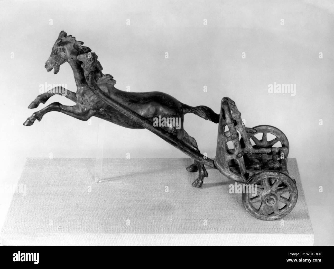 Modern representation of Roman light chariot and horse , bronze Stock Photo