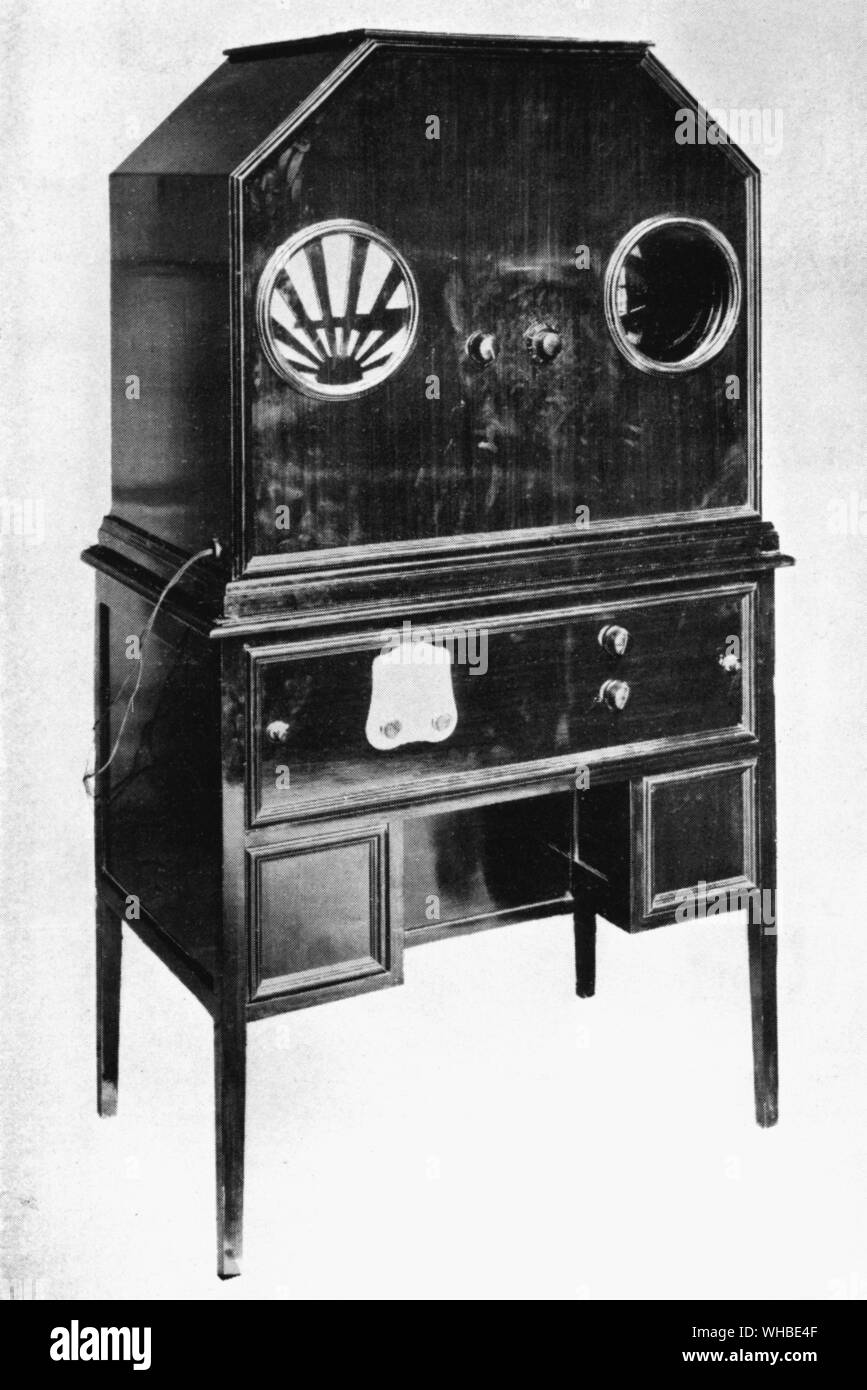 1928 Baird TV set - Televisor Model C - comprises a dual television and super radio set combined with a moving coil loud speaker, fitted in a handsome case, forming a complete self-contained unit for the simultaneous reception of vision and music, singing or speech. List price (ex workds) £150, packing and carriage extra.. Stock Photo