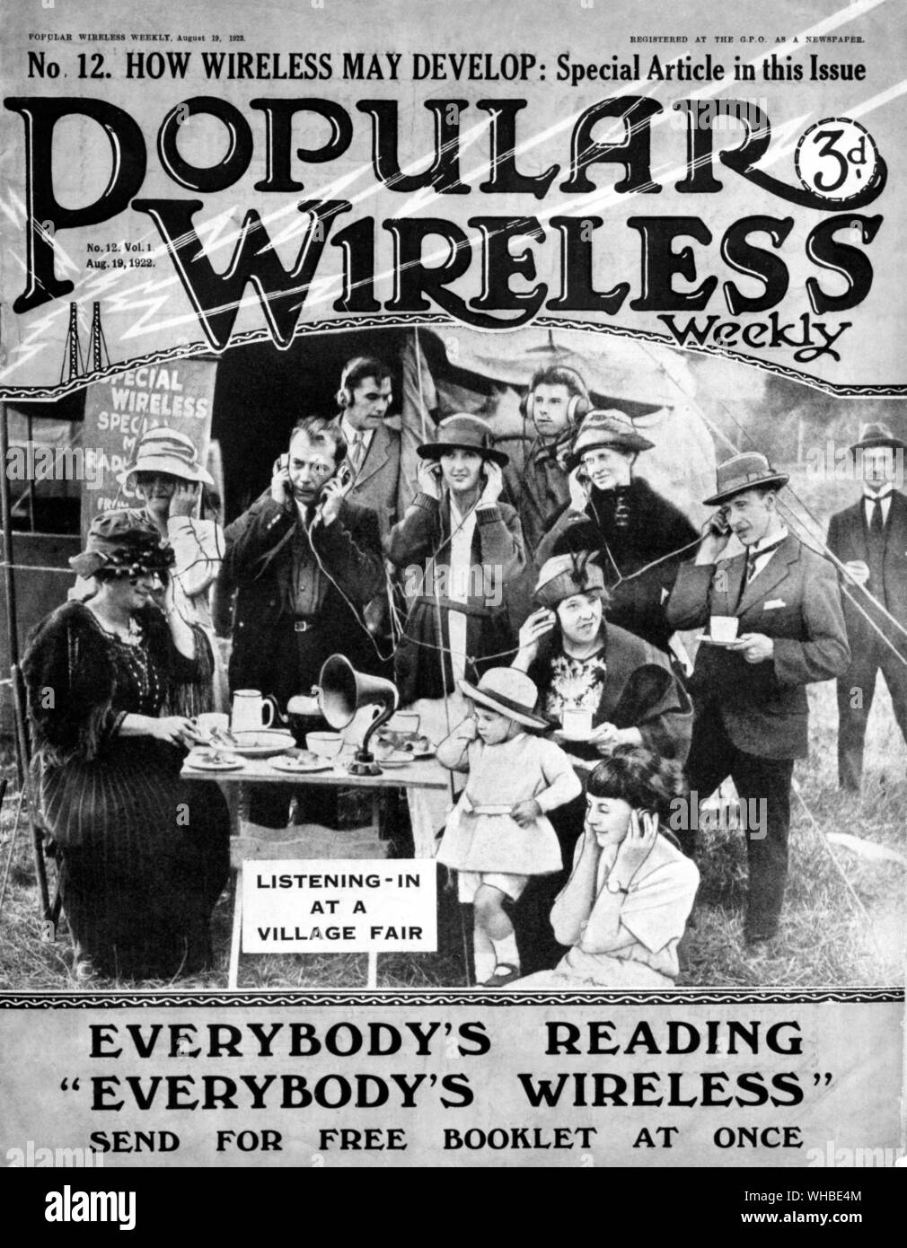 Front cover of Popular Wireless weekly, No. 12 vol. 1 19th August 1922 - How wireless may develop: Special article in this issue - 3d. (Just over 1p in decimal coinage) - picture shows an assortment of people listening-in at a village fair.. Stock Photo