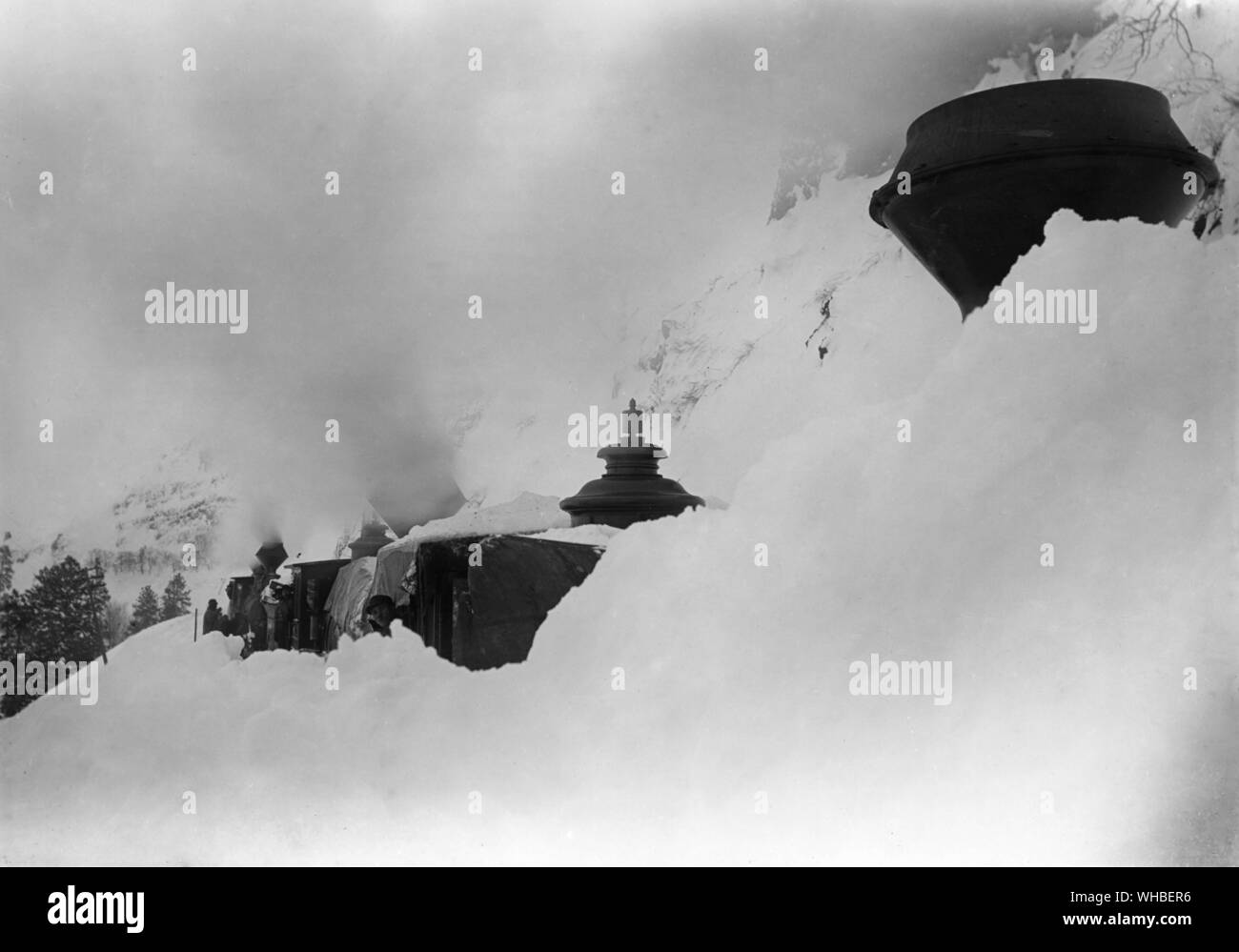 Three engines buried deep in the snow six miles west of the Dalles (Dells). Stock Photo