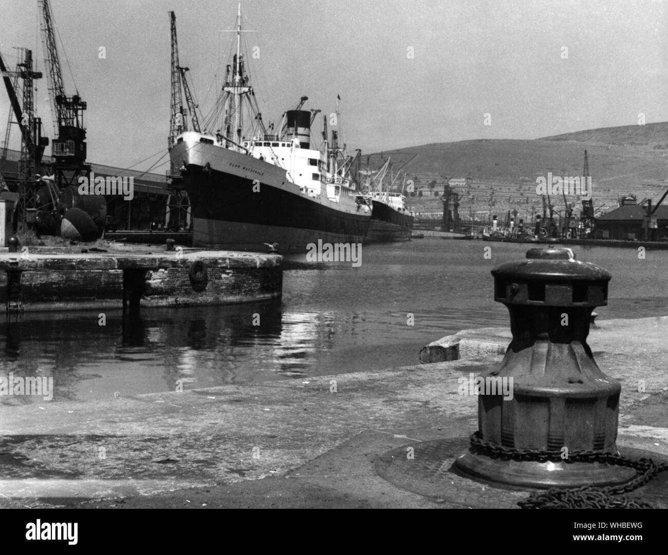 A scene from the extensive docks at Swansea, Glamorganshire, Wales.. Stock Photo