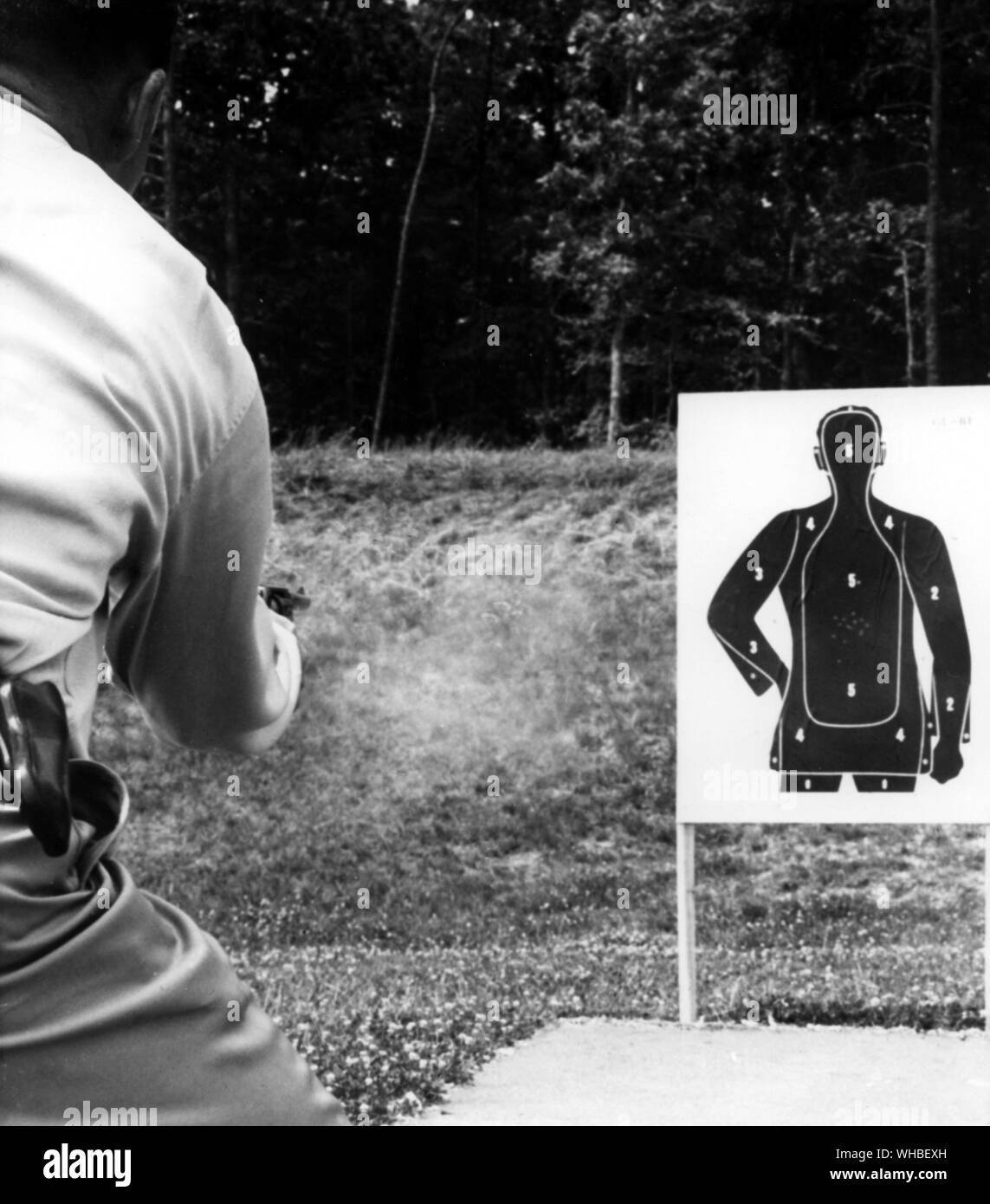 Special agent of the FBI firing from the hip at seven yards on the FBI