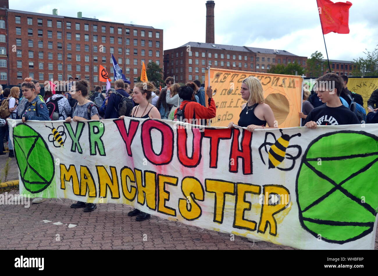 Members of XR Youth Manchester took a prominent role as Northern Rebellion protesters, part of the global movement Extinction Rebellion, marched through Manchester, uk, and held a series of die-ins to urge for action on climate change on September 2nd, 2019. Protest sites included Barclays Bank, a Primark store and HSBC Bank. This was the fourth day of a protest which blocked Deansgate, a main road in central Manchester. Stock Photo
