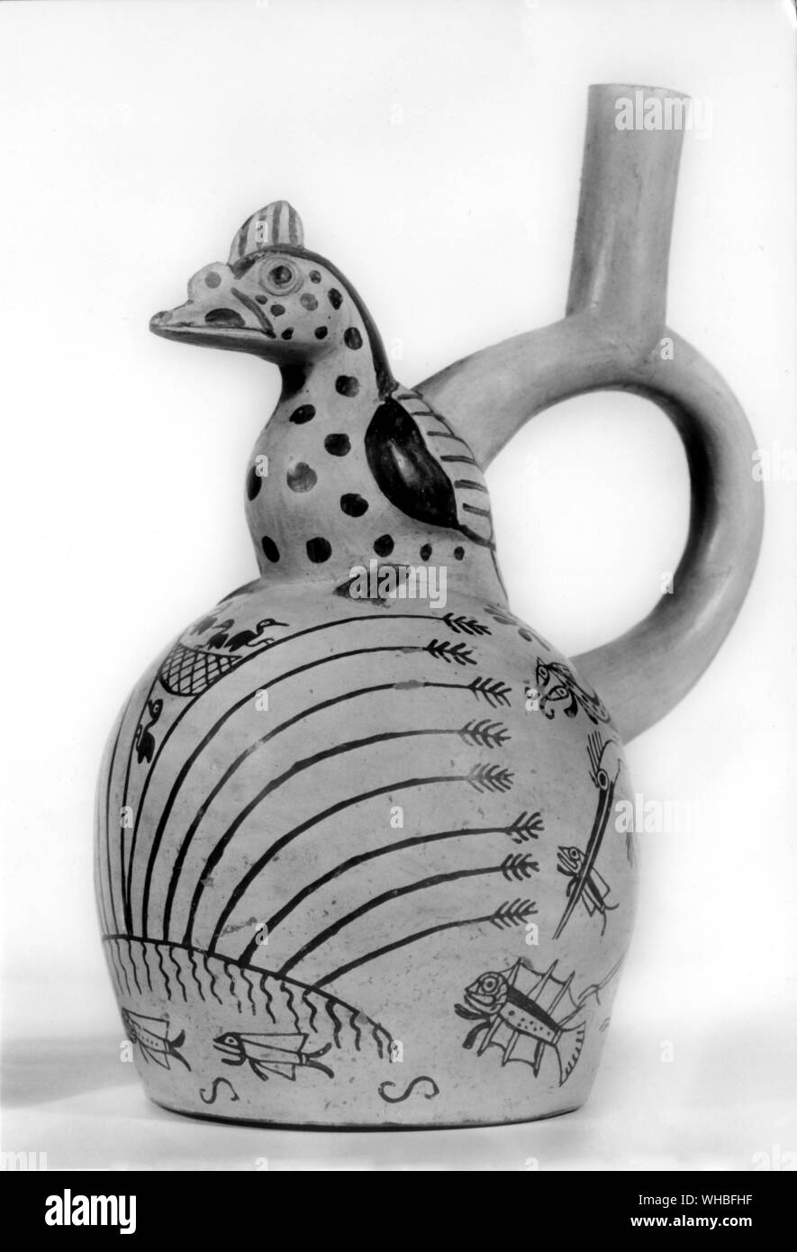 Pottery stirrup spouted vase , ornamented in relief and paint to represent a water fowl sitting on her nest in the reeds . Mochica culture , Peru , c 600 AD Stock Photo