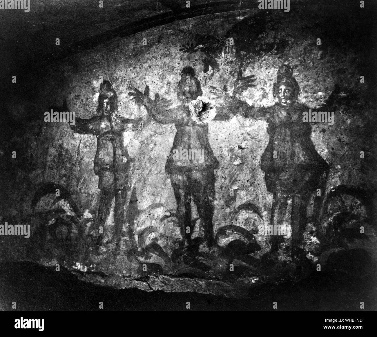 Rome Catacomb of Priscilla. The 3 children in the fiery furnace. Third century painting on the wall Stock Photo