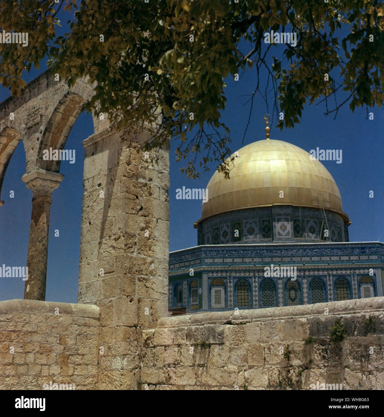 Dome of the Rock, Jerusalem - The Dome of the Rock is an Islamic shrine and a major landmark located on the Temple Mount in Jerusalem. It was completed in 691 making it the oldest extant Islamic building in the world.. Stock Photo