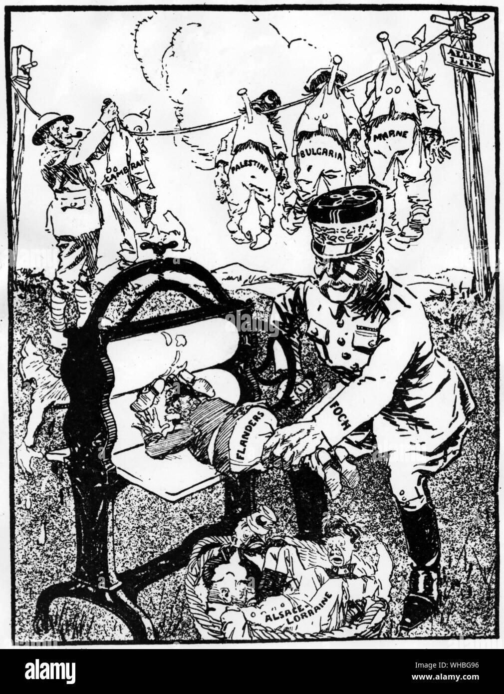 A satirical cartoon featuring Ferdinand Foch. PUTTING THEM THROUGH IT! Stock Photo