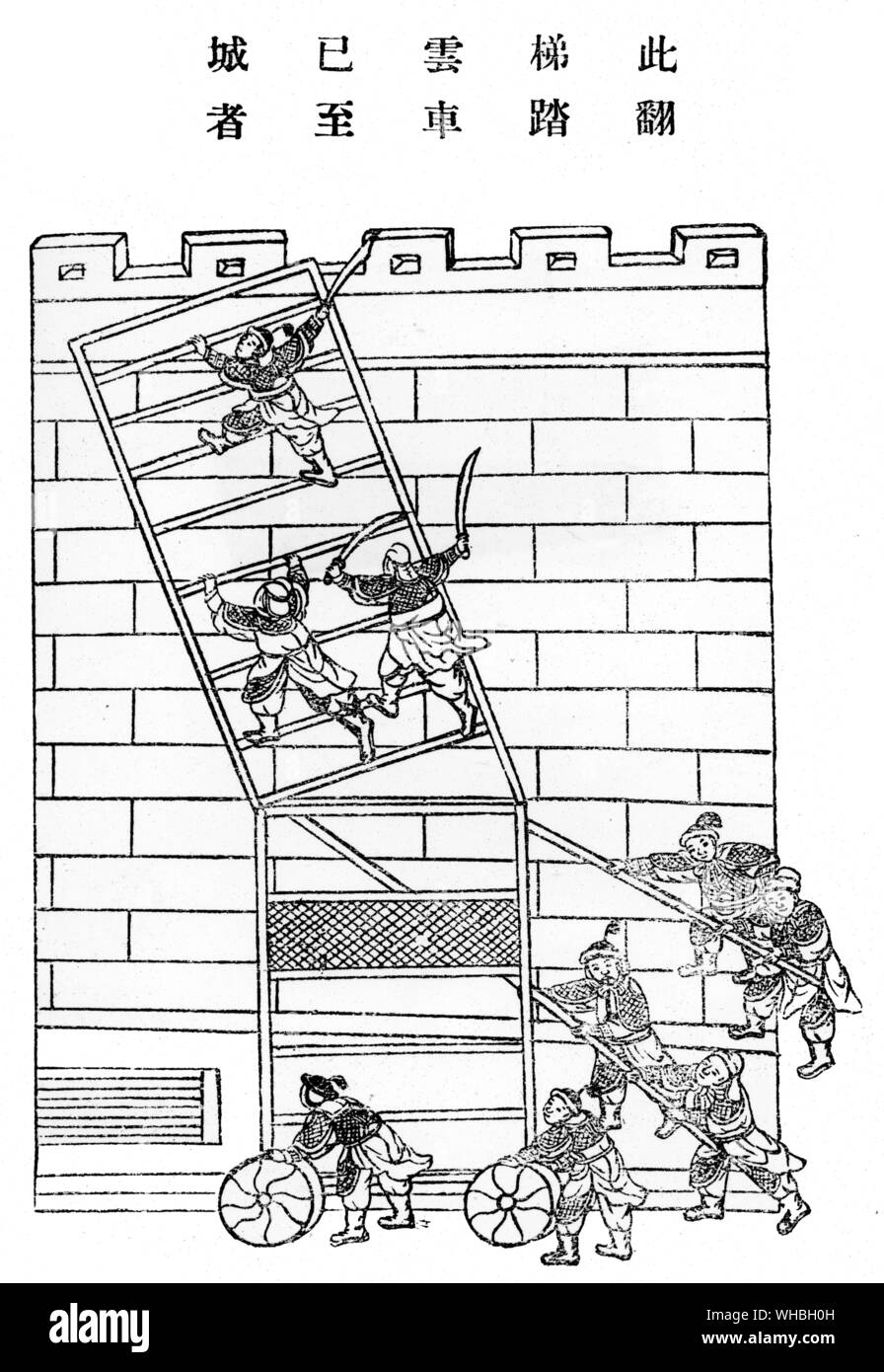 Soldiers scaling ladder at city wall Stock Photo