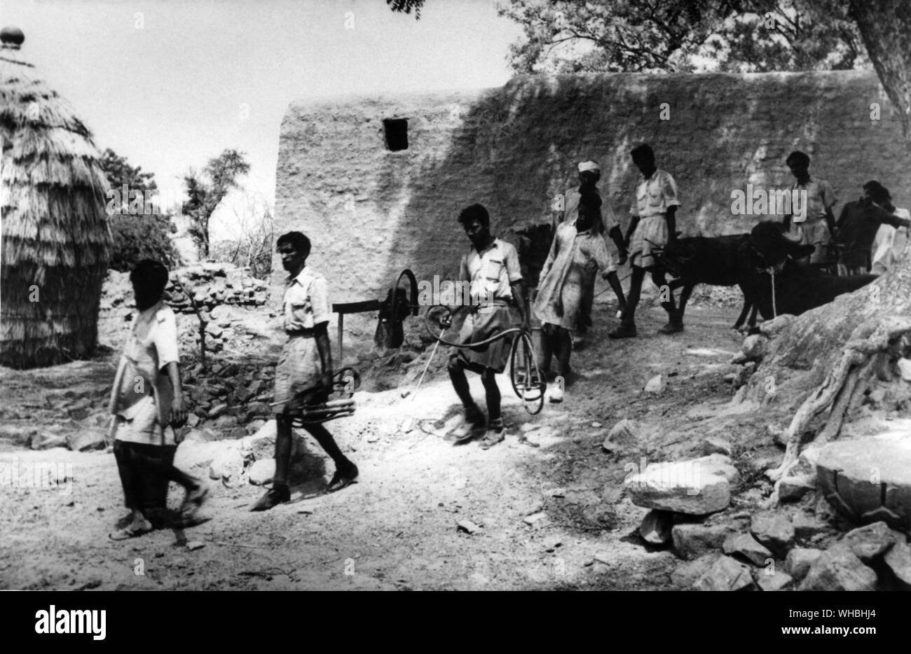malaria Eradication Week . . June 1958. . After finishing thier job in one village , the anti Malaria squad moves out to repeat the process in the next village. . Each malaria unit in each state is equipped with enough insecticides , spraying implements , transport and staff to protect one lakh people in a season Stock Photo