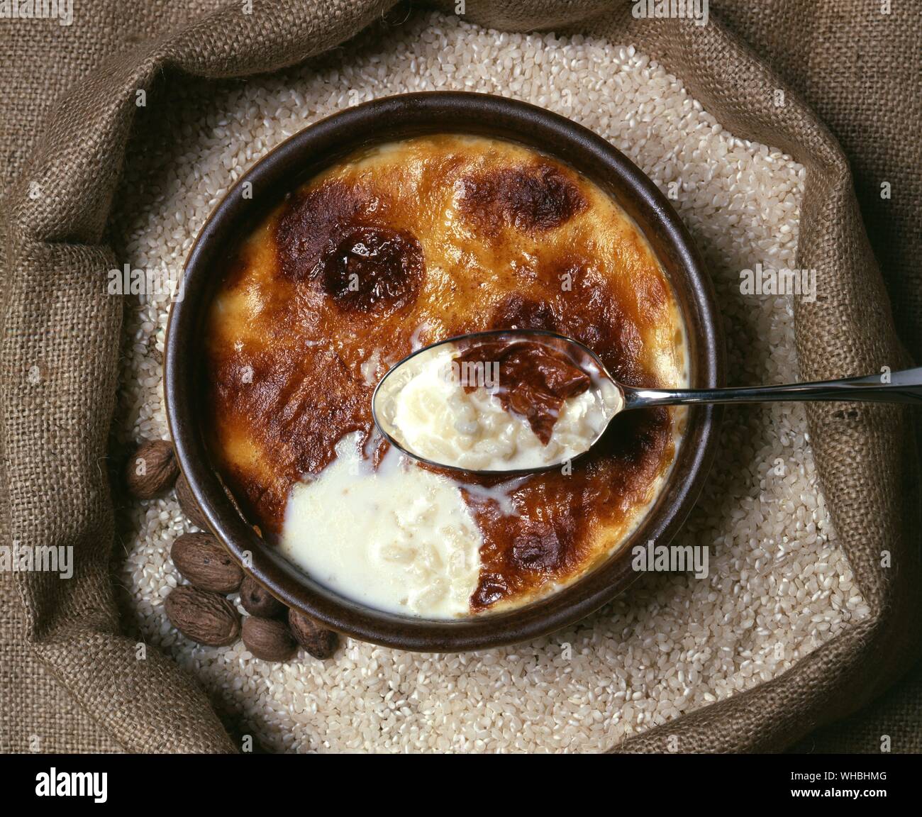 Rice Pudding : dessert enjoyed by people of different cultures all over the world,  made by combining rice with a sweetener and other ingredients Stock Photo