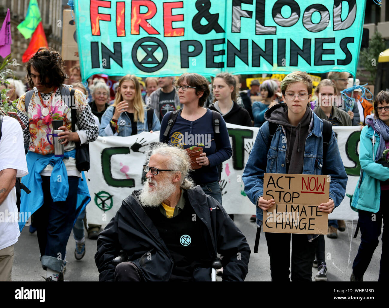 Manchester, UK. 2nd September, 2019. Extinction Rebellion climate protesters take their message around the city centre blocking roads and targeting banks and businesses. Several protesters glued their hands to the premises outside Barclays and HSBC.  The campaigners held several "die ins" outside Primark, HSBC, Barclays business center and on land earmarked for car parking which the campaigners want turned into green space.  Manchester. UK. Credit: Barbara Cook/Alamy Live News Stock Photo