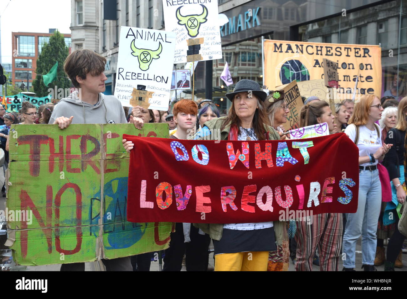 Northern Rebellion protesters, part of the global movement Extinction Rebellion, marched through Manchester, uk, and held a series of die-ins to urge for action on climate change on September 2nd, 2019. Protest sites included Barclays Bank, a Primark store and HSBC Bank. This was the fourth day of a protest which blocked Deansgate, a main road in central Manchester. Stock Photo
