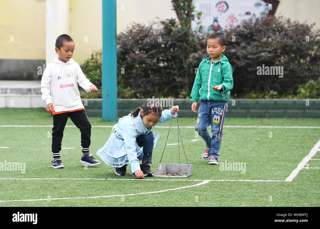 Nanchuan. 2nd Sep, 2019. Students clean the playground at Shiliang Primary  School in Dayou Township of Nanchuan District in southwest China's  Chongqing, Sept. 2, 2019. Shiliang Primary School, composed of 2 teachers