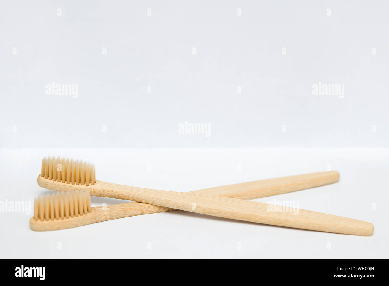 Two bamboo toothbrushes isolated on the white background Stock Photo ...