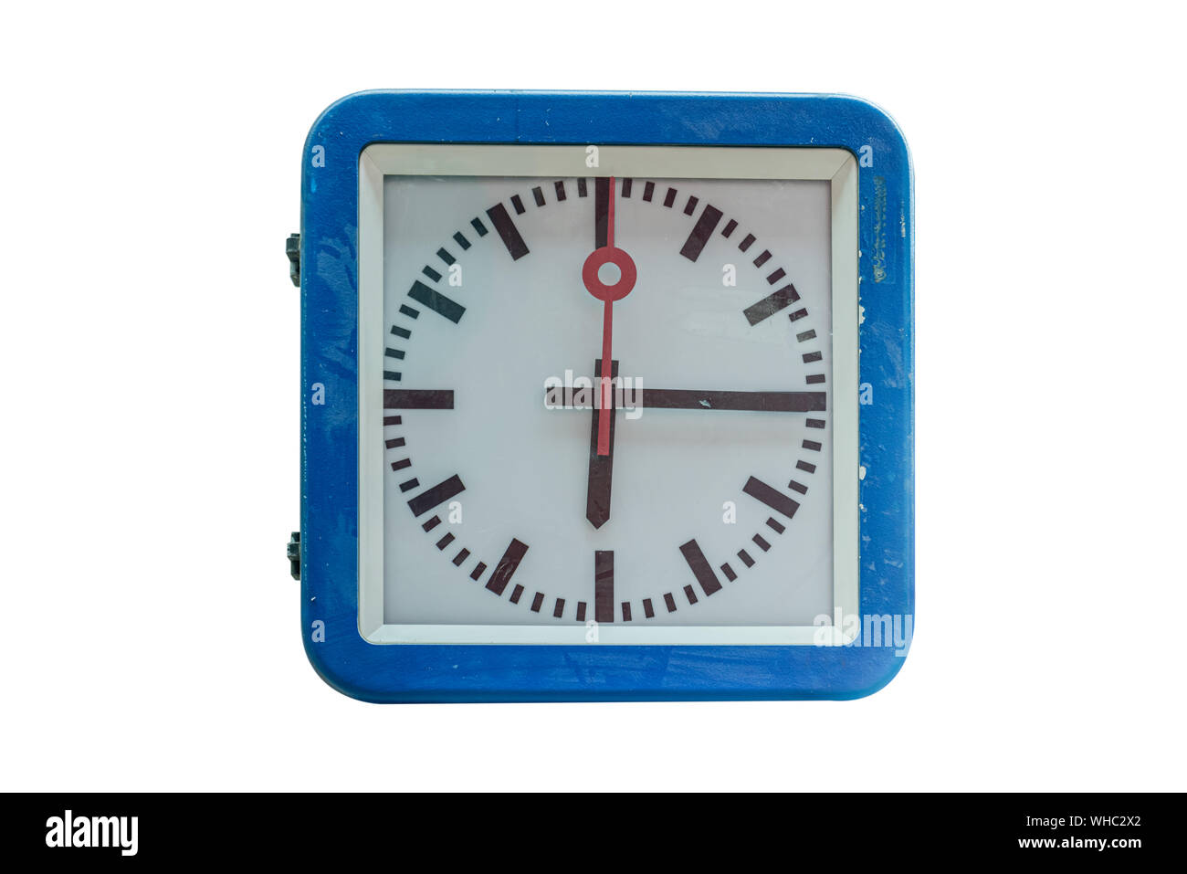 blue train station clock with white plate on a white background blacked pointers  one red pointer Stock Photo