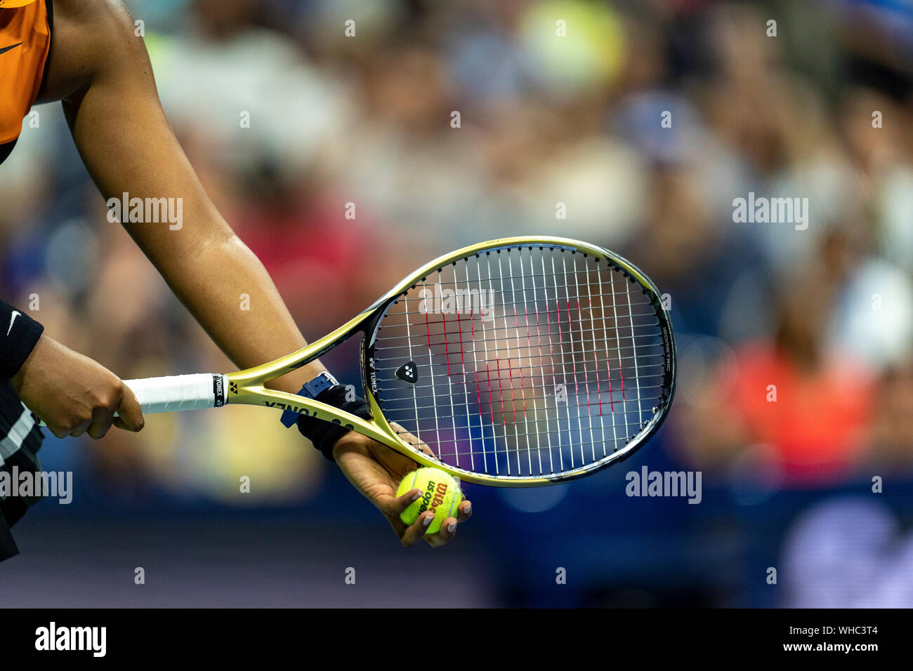 Detail of Naomi Osaka of Japan serving in the third round of the 2019 US Open Tennis Stock Photo