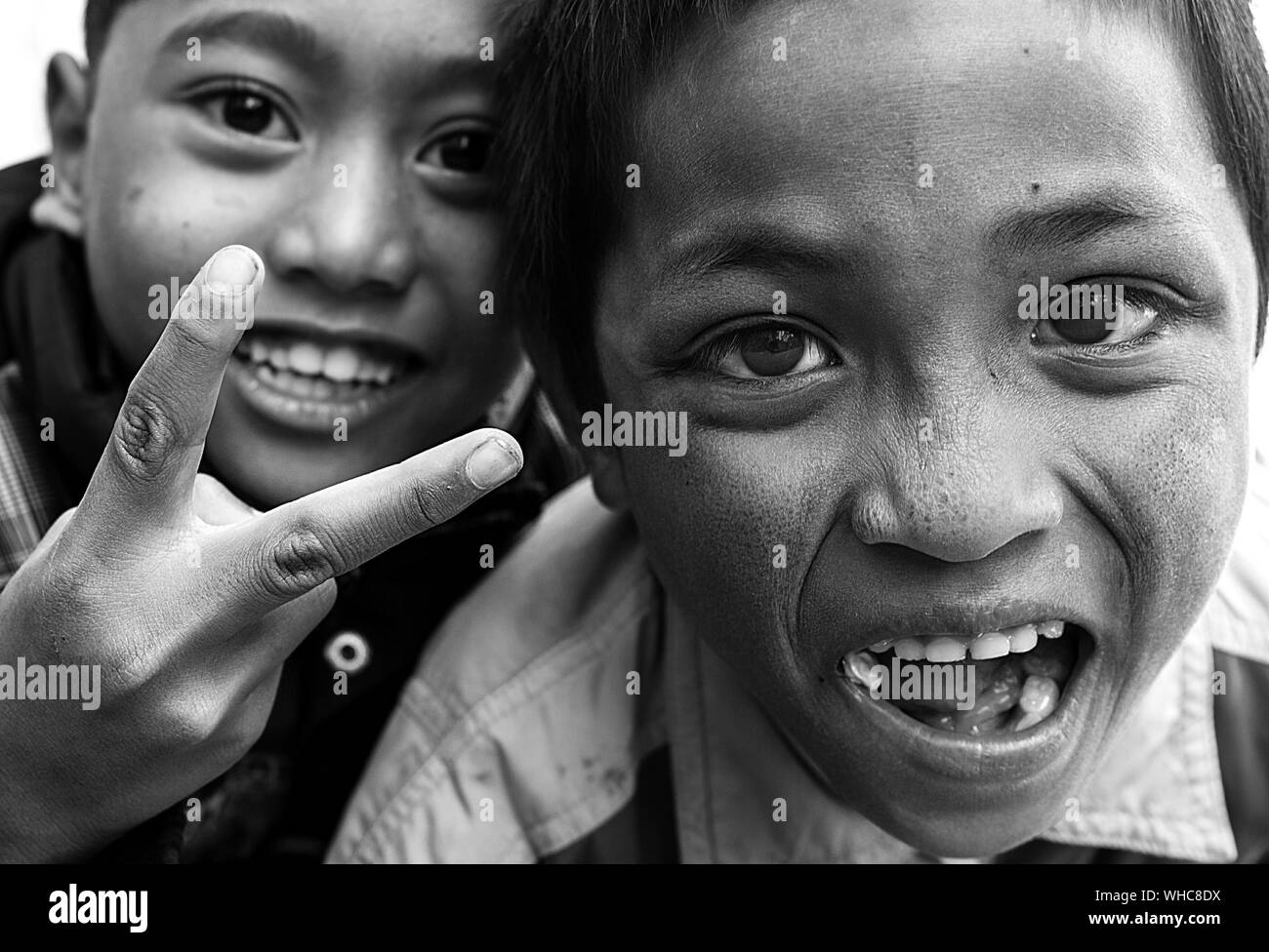 Two indian boys Black and White Stock Photos & Images - Alamy