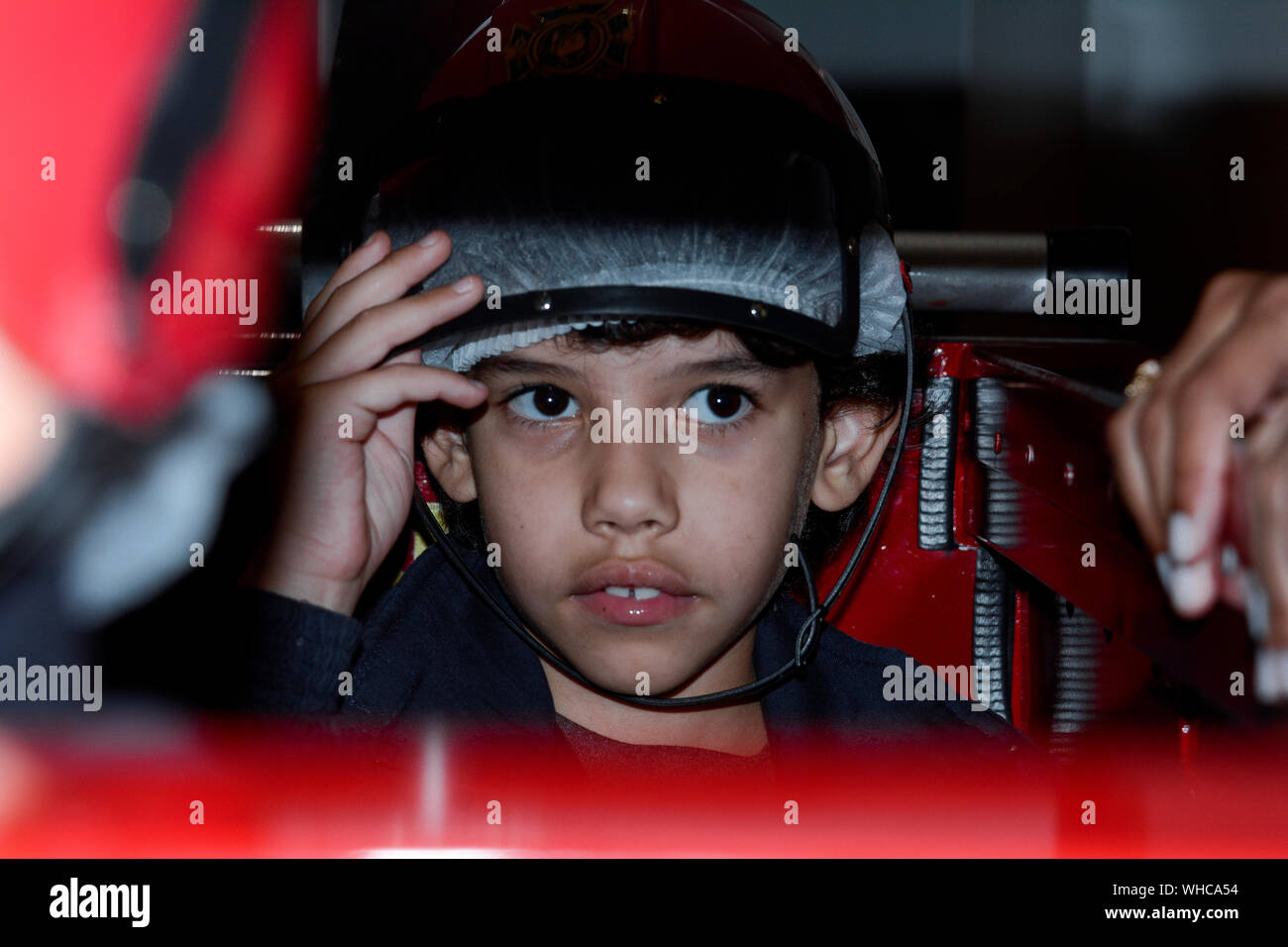 Close-up Of Boy Wearing Sports Helmet Stock Photo