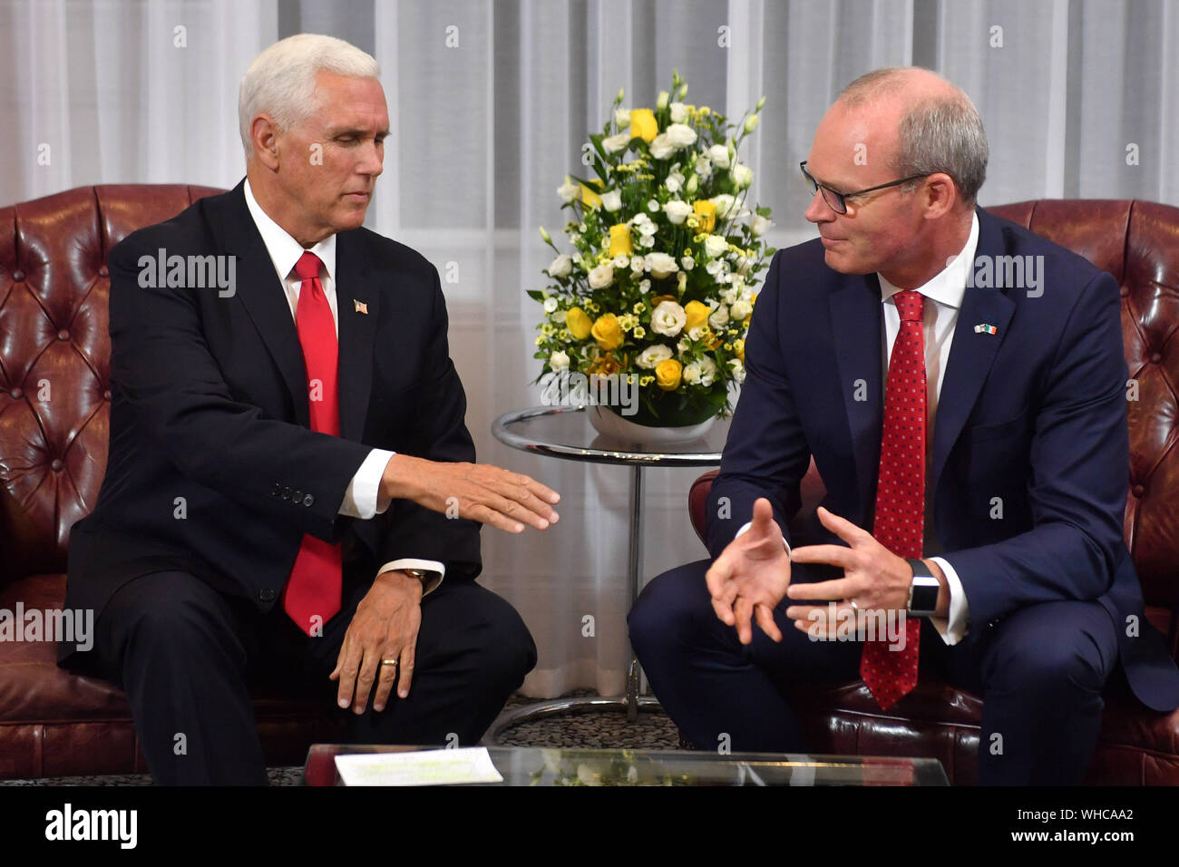 Minister of foreign affairs Simon Coveney (right) at a meeting with US Vice President Mike Pence after he arrived at Shannon airport for the start of an official visit to Ireland. Stock Photo