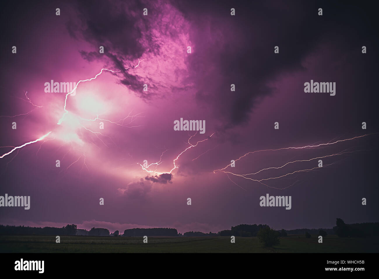 Lightning with dramatic clouds composite image . Night thunder-storm Stock Photo