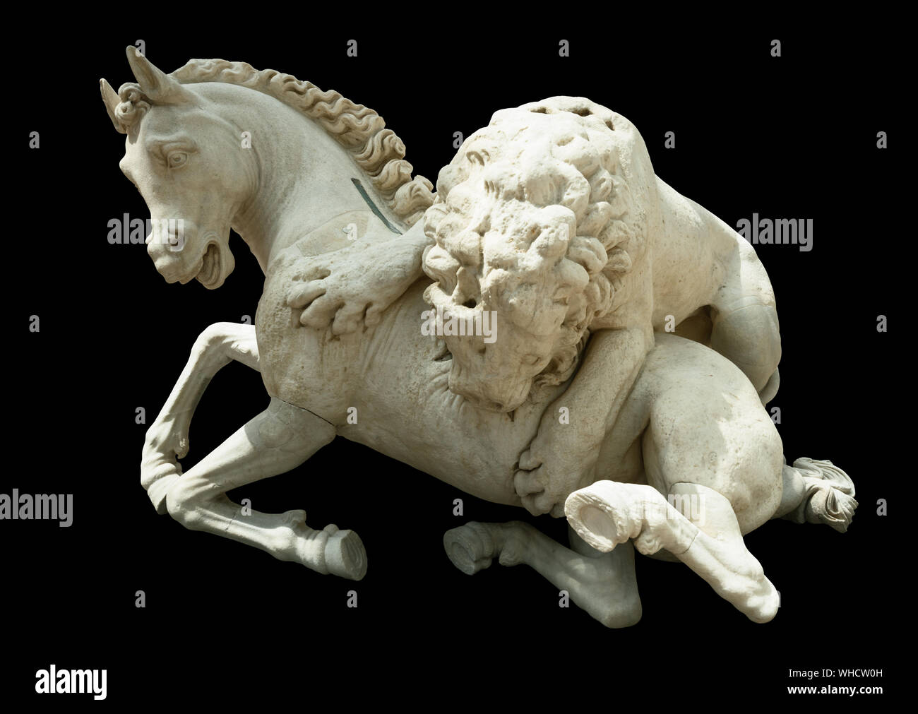 Lion biting the horse. Statue in Capitoline Museums, Rome, Italy. Isolated on black Stock Photo