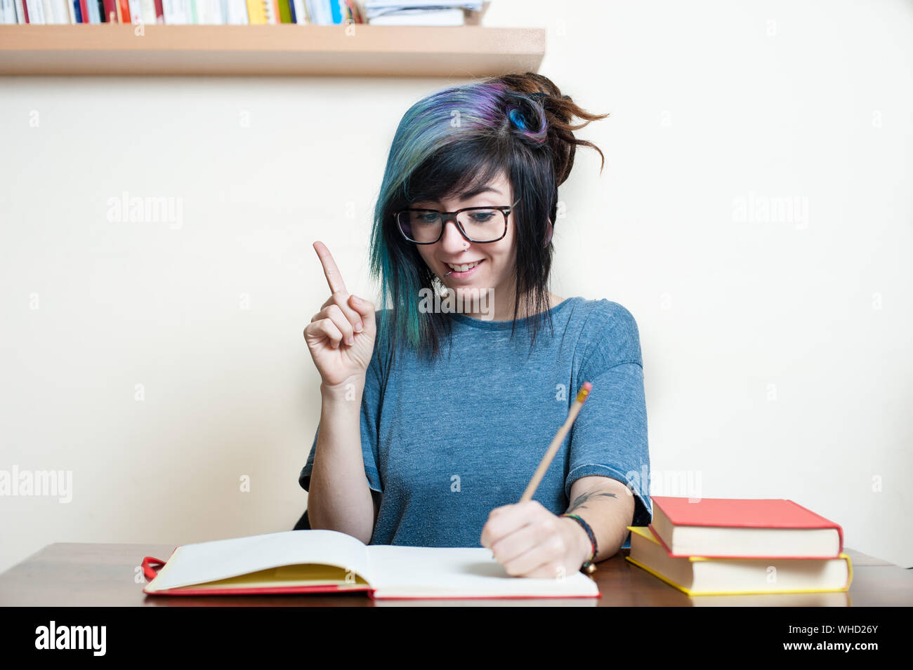 Young Student Finding Solution While Studying At Home Stock Photo