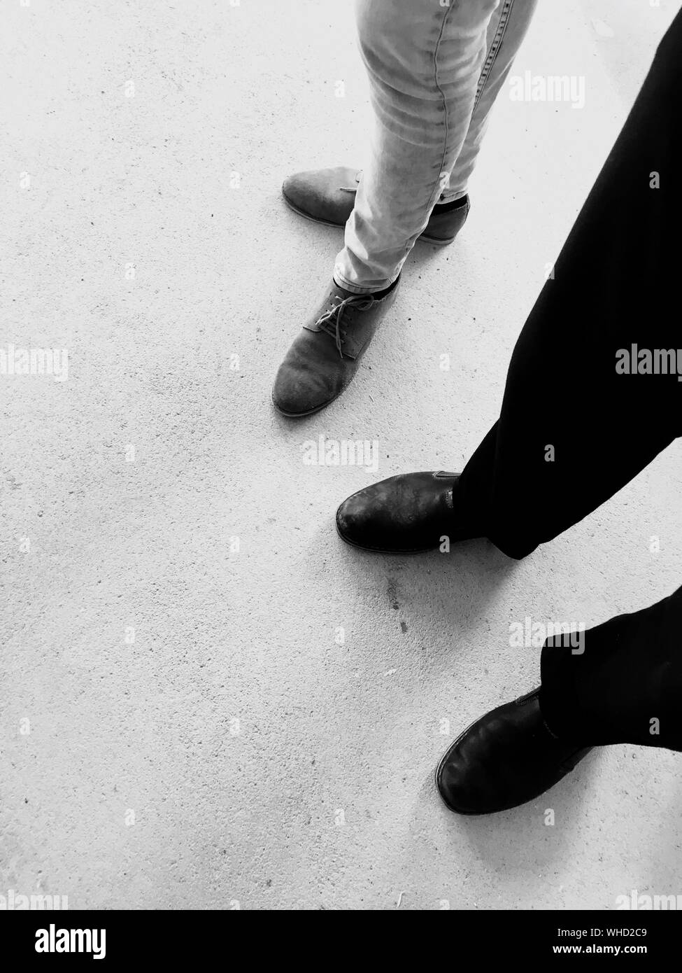 Low Section Of Friends Standing On Floor Stock Photo - Alamy