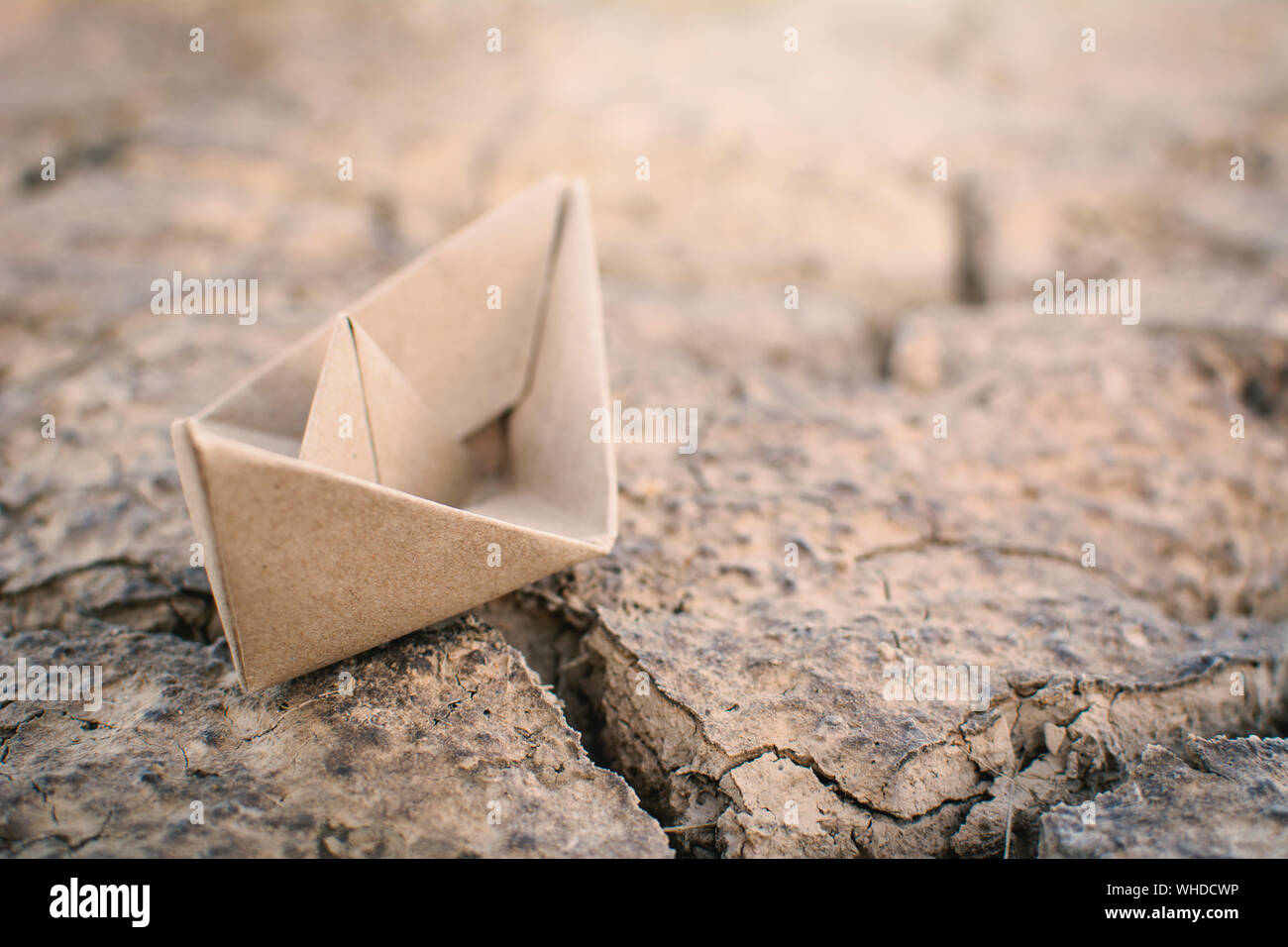 Close-up Of Paper Boat On Field Stock Photo