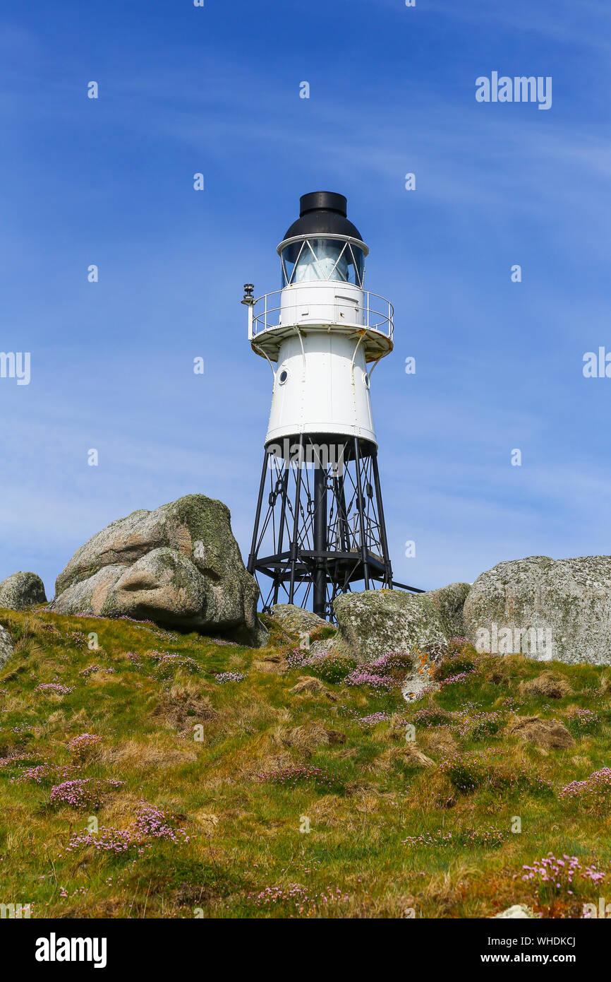 Peninnis Lighthouse, on Peninnis Head, was built by Trinity House in 1911 on St. Mary’s Island in the Isles of Scilly, Cornwall, England, UK Stock Photo